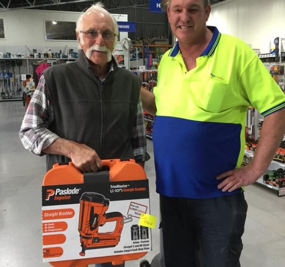 Worker Helping Customer