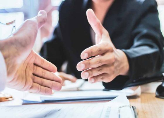 Close Up Shake Hands — H&D Building Supplies in Heatherbrae, NSW