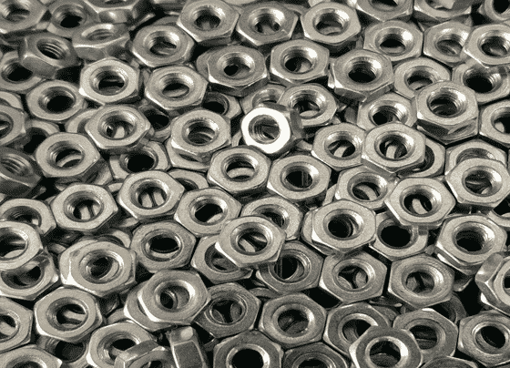 Pile Of Silver Hex Nuts — H&D Building Supplies in Heatherbrae, NSW