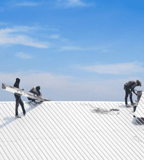Workers Repairing Metal Sheet Roof — H&D Building Supplies in Heatherbrae, NSW