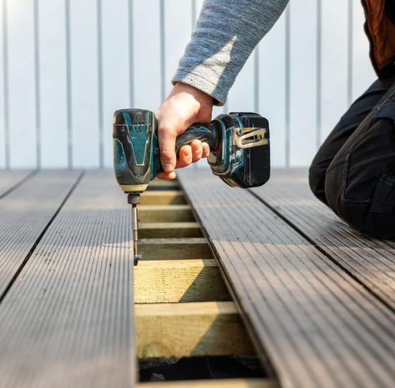 man drilling deck
